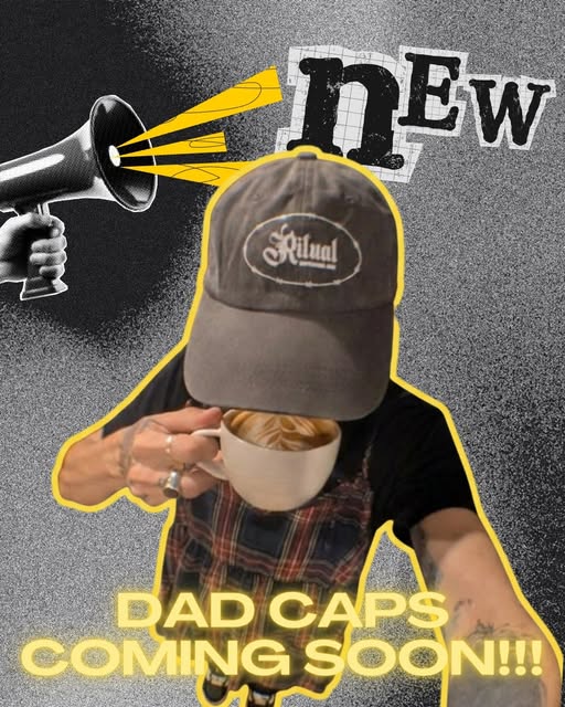 A Ritual latte with the Dad cap merch